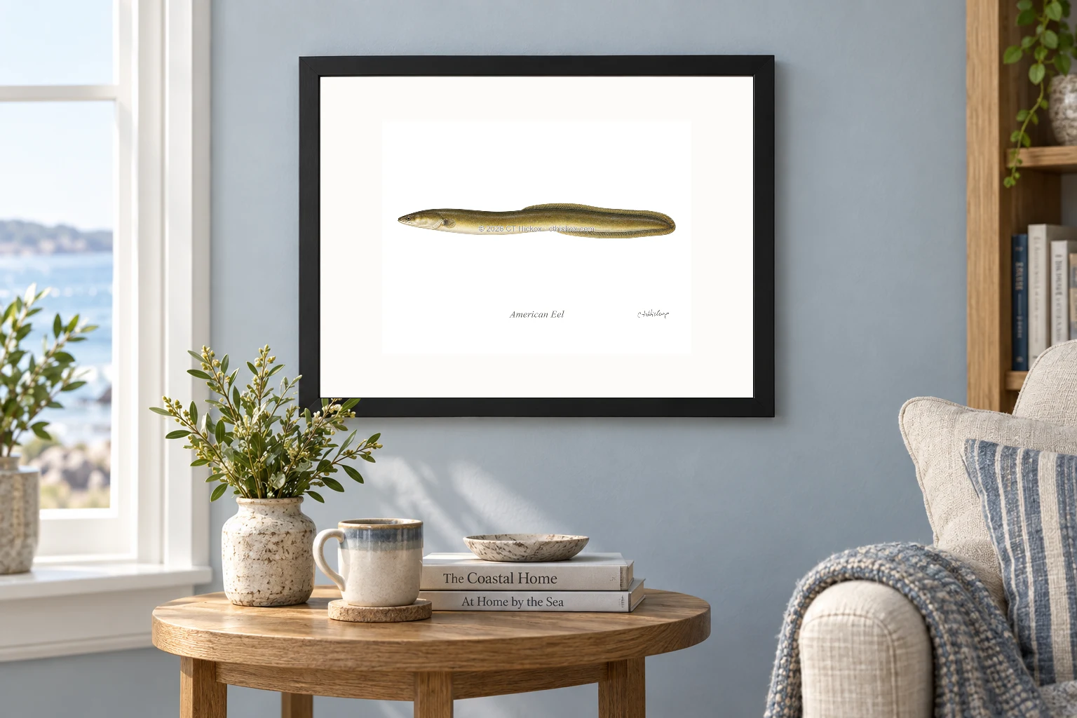 American Eel in a black 14 × 11 landscape frame, white mat and 10 × 8 opening, above a wooden console