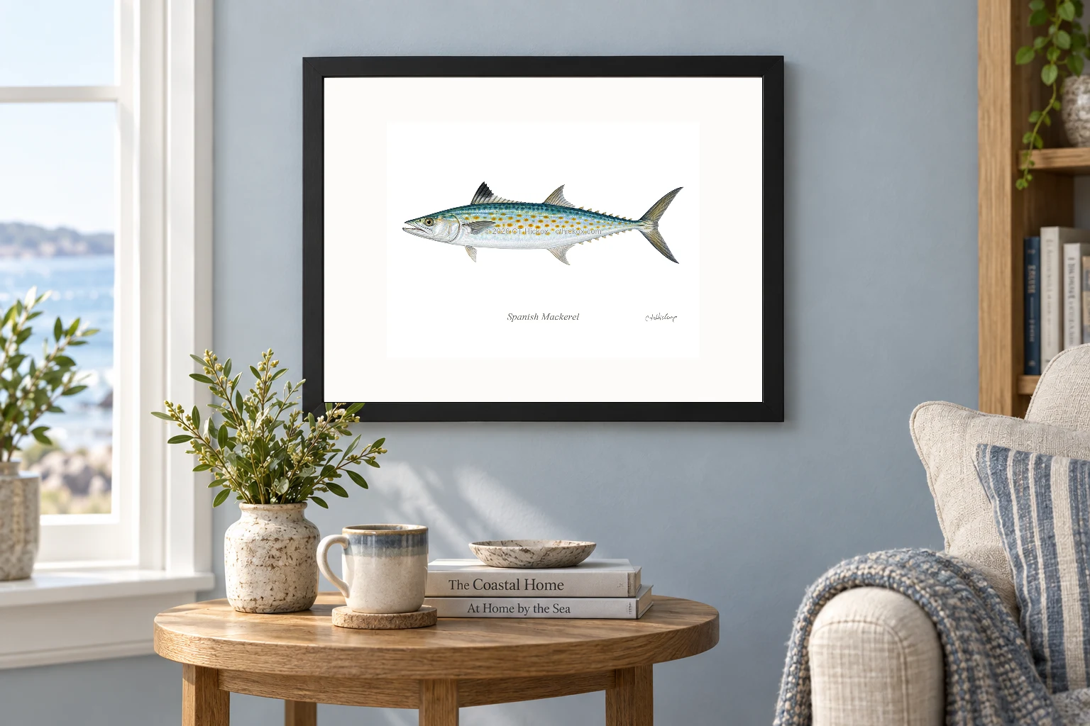 Spanish Mackerel in a black 14 × 11 landscape frame, white mat and 10 × 8 opening, above a wooden console
